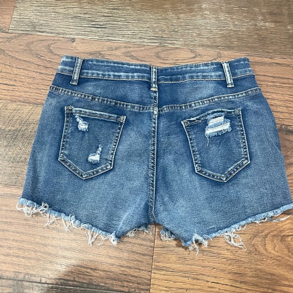 Really cute dark blue jean shorts. SHEIN, size large, unworn. - Picture 2 of 3